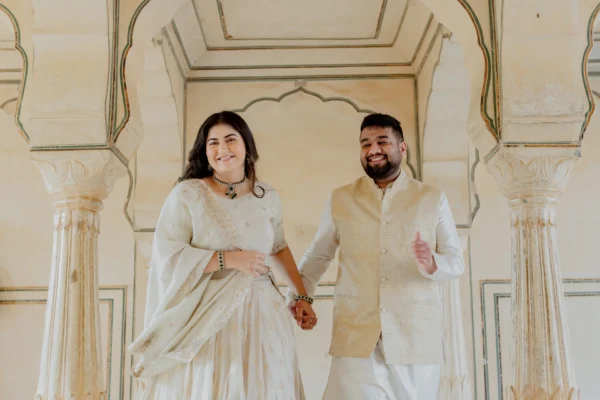 Couple standing face to face inside a fort chamber