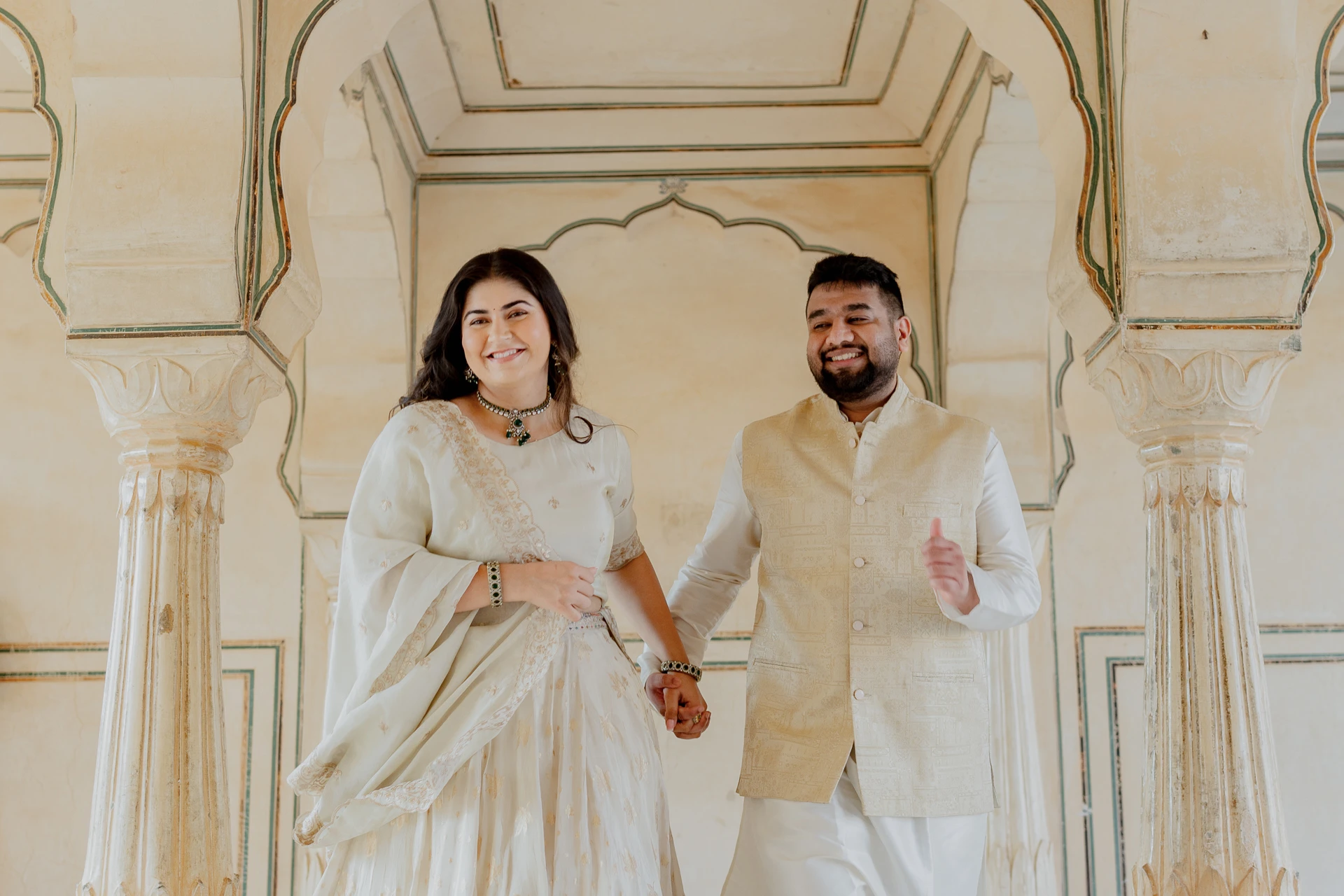 Couple standing face to face inside a fort chamber