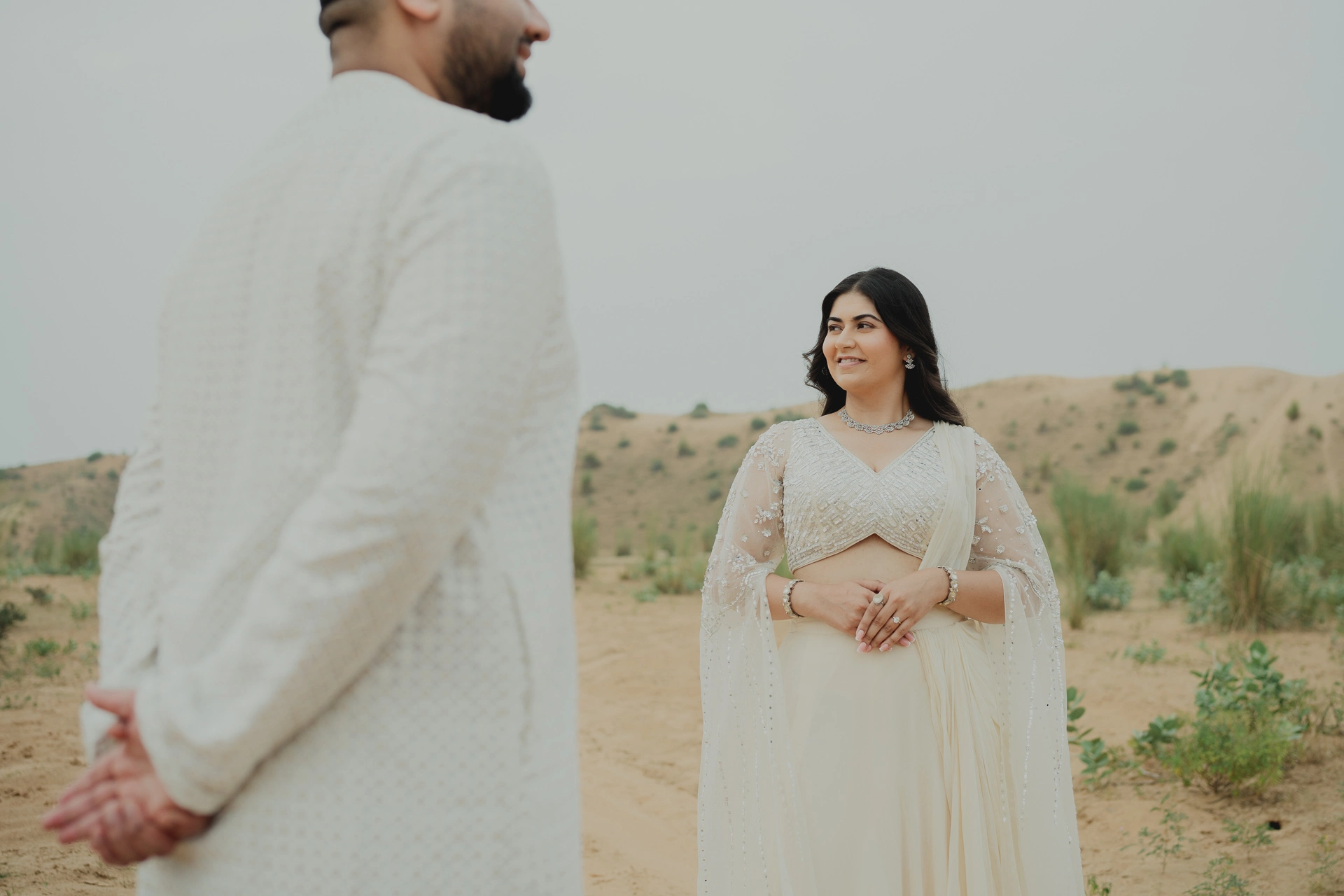 Couple standing face to face outdoors, Jaipur pre-wedding shoot
