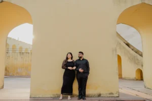 Couple standing near instruments at Jantar Mantar, Jaipur