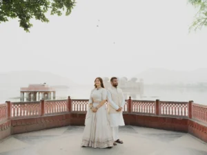 Couple standing together with lake in the background, Jaipur pre-wedding shoot