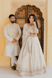 Couple walking together through a fort corridor, Amer Fort